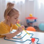 Little Learners Academy - girl-playing-with-playdough